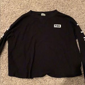 pink cropped long sleeve shirt